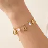 Pulsera Taina estilo oceánico de acero inoxidable transfronteriza europea y americana para mujer con estrella de mar, conchas, perlas, circonita en forma de corazón y diseño de cadena de tenis