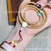 Pulseira Original de Novo Design com Múltiplos Círculos com Sementes de Flor da Paixão, Ágata, Contas Dzi e Osso de Magnésio Pulseira de Três Peças