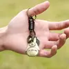 Estilo Criativo Fofo Bronze Antigo Desenho Animado Gato Gordo Decoração de Anel Pingente de Bolsa Couro Trançado Artesanal Chaveiro de Carro