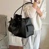 Bolsa de cordón de gran capacidad para mujer 2026 bolsa cruzada de moda bolso de mano diagonal elegante bolso de hombro nuevo casual popular para el día a día