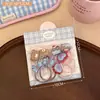 Lindo set de accesorios para el cabello de dibujos animados en color café, que incluye pequeñas ligas para el cabello elásticas que son suaves con el cabello y pasadores versátiles para niñas, incluyendo pasadores para flequillo
