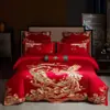 Juego de cuatro piezas para boda, 100% algodón puro, sábana y funda de edredón bordadas en rojo brillante, alta gama, perfecto para una suite nupcial