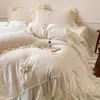 Juego de lujo de invierno estilo francés de cuatro piezas con delicado bordado, tela de terciopelo de leche, una funda nórdica de forro polar coral estilo princesa y una falda de cama cálida y engrosada