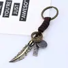 Pingente Criativo e Personalizado de Pena em Bronze Antigo Chaveiro Decorativo, Acessório Versátil de Couro Trançado Estilo Étnico Vintage