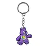 Colgante de llave de oso arcoíris al por mayor del fabricante hecho de material de goma suave de PVC, llavero grabado DIY accesorio pequeño de alta gama