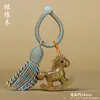 Sandalia del Año del Caballo Caballo Tallado en Sándalo Caballo Mecedora Colgante con Borla Encanto para Bolso Llavero del Caballo del Zodiaco con Cuerda Tejida
