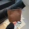 Bolso Cubo Aislado de Moda para Mujer 2025 Nuevo de Gama Alta Suave Simple Versátil Compartimento Único Bolso Cruzado Moderno