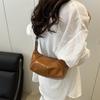 Bolsa de Ombro de Couro Macio Design de Nicho Novo Verão 2025 Bolsa Transversal Cor Pura de Alta Qualidade Bolsa Dumpling Estilo Estrangeiro Bolsa Feminina