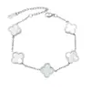 Pulsera de acero de titanio chapada en oro de 18k, de cuatro hojas, lisa, de moda, de venta caliente, con nácar de doble cara, fábrica de joyería de alta gama para mujer