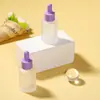 Guangzhou Spot Macaron Frasco de Essência com Ombro Caído Anel Colorido Esfoliante Óleo Essencial Engarrafado Frasco com Conta-gotas 30ml