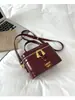 Bolsa quadrada pequena elegante estilo bolsa de mão para mulheres, nova versão coreana 2026, bolsa de ombro e transversal moderna e fashion para o dia a dia.