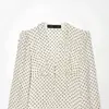 Moda femenina transfronteriza 2026 estilo europeo y americano cuello en V estampado de lunares top tipo camisa ajustado con volantes para mujer E490789