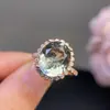 Anel de cristal verde natural! O cristal está limpo! A cor fogo é super forte! O tamanho da pedra solta é 10*12mm