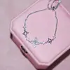 Pulsera Ajustable con Cordón de Flor de Iris Super Brillante con Circonitas Completas para Mujer Modelo Nuevo 2026 Joyería Versátil de Gama Alta de Nicho