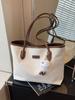 Bolso de mano individual de gran capacidad para mujer, bolso de hombro versátil y moderno, bolso de mano sencillo para ir al trabajo, primavera y verano 2025.