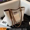 Bolsos para Mujer 2026 Otoño e Invierno Nuevo Estilo Bolso de Mano de Lona Bolso Tote de Gran Capacidad Bolso de Hombro para Viajes de Negocios Equipaje