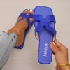 Pantuflas Planas de Exterior para Mujer 2025 Verano Nuevas Versátiles de Una Tira Sandalias de Playa Zapatos para Mujer de Comercio Exterior Transfronterizo
