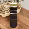 Nuevos calcetines a rayas de bloques de color otoño e invierno para mujer, calcetines apilados de encaje con lunares verde café, calcetines versátiles de moda japoneses de media pantorrilla