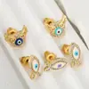 Venta caliente transfronteriza pendientes pequeños y exquisitos de ojo de diablo personalidad retro francesa nicho creativo pendientes de hip-hop joyería
