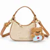 Nueva Mini Bolso de Axila Infantil para Niñas Bolso de Mano de Media Luna Bolso Pequeño con Colgante de Oso Lindo Bolso para Viaje de Bebé