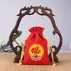 Bolsa de embalaje pequeña de brocado para la suerte al por mayor de fábrica bolsa de tela roja Bolsa de regalo antigua bolsa de la suerte con logo impreso