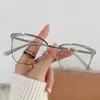 Gafas Fotocromáticas Versátiles de Moda Ultraligeras con Filtro de Luz Azul Montura Hueca Lisa Estilo Retro Metálico Gama Alta Se Pueden Personalizar con Graduación