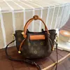 Bolso Cruzado de Textura de Alta Calidad Guti Kou 2026 Nuevo Estilo Moda Versátil Bolso de Axila Bolso de Mimbre de Nicho