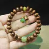 Venta al por mayor de fábrica Cuentas de ábaco de palo de rosa negro Pulseras de cuentas de lentejuelas Sándalo Colgantes pequeños de capullo de loto Pulseras de cuentas de oración Gran cantidad Precio favorable