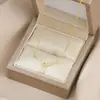 Corrente de clavícula elegante com zircônia eletrobanhada em ouro verdadeiro, design de nicho feminino, colar com gota d'água e personalidade, colar combinando