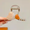 Pinza para el pelo de estrella con garra y estampado de leopardo estilo retro, dulce y fresca, para recogidos, pinza de acetato de gato y tiburón, accesorio de pelo elegante en forma de corazón