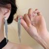 Pendientes de borla de amor de metal líquido para mujer, ligeros, lujosos y elegantes, largos, con diseño de nicho, de alta calidad, nuevos