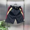 Pantalones cortos casuales de secado rápido a juego de colores de verano para hombre, pantalones holgados de cinco puntos a juego, pantalones deportivos de playa grandes