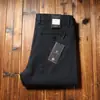 Estación europea otoño e invierno algodón grueso elástico lavado pantalones para hombre cintura media rectos holgados pantalones casuales de negocios para hombre