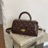 Bolso de mano rombo de moda transfronterizo 2026 Otoño Nuevo Versátil Lujo Ligero Sensación de Alta Gama Para Viajar Cruzado Pequeño Cuadrado