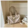 Bolsa tote casual de alta qualidade para mulheres, nova coleção primavera 2026, bolsa de ombro e transversal estilosa vintage personalizada e moderna