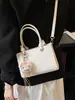 2026 Bolso Cuadrado Pequeño de Nuevo Estilo Coreano de Diseño Nicho para Mujer, Bolso Cruzado, Bolso de Mano de Moda y Sencillo