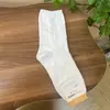 Calcetines de Algodón de Caña Media con Estampado Completo de Lazo Nuevos para Primavera Temprana de Mujer Importados de Kikiya Dongdaemun Coreano