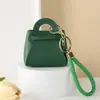 Bolsa para monedas pequeña de color caramelo linda estilo coreano, monedero, llavero para llaves, bolsa pequeña creativa de macarrón para llevar en la mano