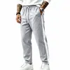 Pantalones deportivos jogger casuales para hombre, de pierna recta, holgados, de color liso y bloques de color, para otoño e invierno, transfronterizos, europeos y americanos, 2026, venta al por mayor
