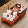 Juego de té de viaje traje pequeño cerámica exterior hogar Kung Fu una tetera cuatro tazas tetera taza portátil regalo creativo