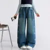 Jeans de primavera e outono para meninas 2026 novo jeans casual estilo coreano de perna reta com design de coração na lateral para meninas mais velhas