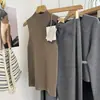 Shanghai Dan Nong Tejido/2026 Sin Costuras Lana Fina Otoño/Invierno Chaleco de Cuello Alto Traje de Suéter para Mujer Capa Base