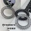 Elegante anillo de pelo de línea telefónica transparente de color claro para viento frío negro ins alto valor de color no daña el pelo cuerda para el pelo sin costuras
