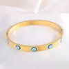 Artículo Popular Transfronterizo: Pulsera Ojo Azul para Parejas, Diseño Sencillo Original, Pulsera de Acero de Titanio que No se Desvanece, Joyería al por Mayor