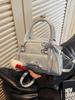 Bolso tipo almohada de moda para mujer 2026 Nuevo modelo Bolso de hombro de gran capacidad con un toque de alta gama Bolso casual para el hombro