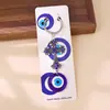 Nuevo llavero transfronterizo con colgante de elefante, palmera y pavo con ojos azules, para bolso o coche.