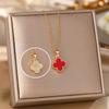 Collar de acero de titanio dorado de doble cara con trébol de cuatro hojas para mujer, cadena de clavícula simple de temperamento de alta calidad, colgante de clavícula de cuatro hojas, joyería para mujer