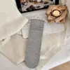Meias femininas estilo Miu, meias caneladas de cor sólida estilo coreano na altura da panturrilha, novas meias versáteis empilháveis de outono, meias longas sem costura absorventes de suor