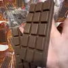 Juguete Antiestrés Squishy de Chocolate de Rebote Lento, Suave y Apachurrable con Textura de Barro, Sensación de Chuparse el Dedo para Niños y Niñas