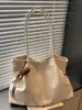 Bolsa grande retrô casual transfronteiriça para mulheres, nova bolsa tote casual para o dia a dia, bolsa de ombro de grande capacidade moderna para o trabalho